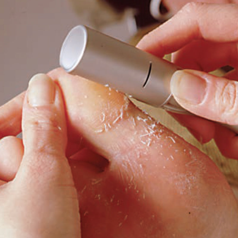 NSK OMNICUT - מכשיר טיפולי להסרת יבלות ועיבוי עור בכף הרגל